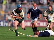 15 October 2000; Ollie Canning of Ireland during the Hurling Shinty International match between Ireland and Scotland at Croke Park in Dublin. Photo by Brendan Moran/Sportsfile