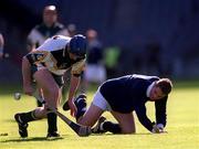 15 October 2000; Conor McCambridge of Ireland in action against Magnus MacFarlane-Barrow of Scotland during the Hurling Shinty International match between Ireland and Scotland at Croke Park in Dublin. Photo by Ray McManus/Sportsfile