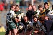 15 October 2000; Ireland captain DJ Carey looks to see if all his players are present before the team photo prior to the Hurling Shinty International match between Ireland and Scotland at Croke Park in Dublin. Photo by Brendan Moran/Sportsfile