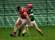 22 October 2000; Pat Sexton of Cork in action against Don Anderson of Limerick during the Waterford Crystal South East Hurling League match between Limerick and Cork at Gaelic Grounds in Limerick. Photo by Damien Eagers/Sportsfile