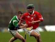 22 October 2000; Eoin Fitzgerald of Cork in action against Dave Stapleton of Limerick during the Waterford Crystal South East Hurling League match between Limerick and Cork at Gaelic Grounds in Limerick. Photo by Damien Eagers/Sportsfile