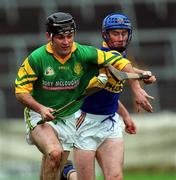 30 October 2000; Tony Delaney of Toomevara in action against Paul O'Grady of Patrickswell during the AIB Munster Senior Club Hurling Championship Quarter-Final match between Toomevara and Patrickswell at Semple Stadium in Thurles, Tipperary. Photo by Ray McManus/Sportsfile