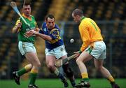 30 October 2000; Anthony Carmody of Patrickswell in action against Justin Cottrell of Toomevara during the AIB Munster Senior Club Hurling Championship Quarter-Final match between Toomevara and Patrickswell at Semple Stadium in Thurles, Tipperary. Photo by Ray McManus/Sportsfile