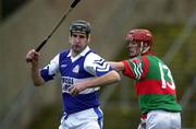 4 November 2000; Paul Cuddy of Castletown in action against Rory Hanniffy of Birr during the AIB Leinster Club Hurling Championship Quarter-Final match between Castletown and Birr at O'Moore Park in Portlaoise, Laois. Photo by Ray McManus/Sportsfile