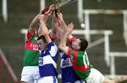 4 November 2000; Sean Hanlon and Cyril Cuddy of Castletown in action against Gary Hanniffy and Declan Pilkington of Birr during the AIB Leinster Club Hurling Championship Quarter-Final match between Castletown and Birr at O'Moore Park in Portlaoise, Laois. Photo by Ray McManus/Sportsfile