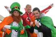 28 February 2009; Ireland supporters Seamus Hoctor and his brother Daryl, right, from Offaly, with England supporter Elaine Rothwell, from London, England, on their way to the game. RBS Six Nations Rugby Championship, Ireland v England, Croke Park, Dublin. Picture credit: Pat Murphy / SPORTSFILE