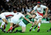 28 February 2009; Tommy Bowe, Ireland, breaks the tackle of Riki Flutey, Harry Ellis, 9 and Nick Kennedy, England. RBS Six Nations Rugby Championship, Ireland v England, Croke Park, Dublin. Picture credit: Brendan Moran / SPORTSFILE