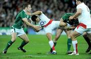 28 February 2009; Riki Flutey, England, is tackled by Tomas O'Leary, left, and Jamie Heaslip, Ireland. RBS Six Nations Rugby Championship, Ireland v England, Croke Park, Dublin. Picture credit: Brendan Moran / SPORTSFILE