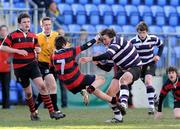 4 March 2009; Adam Somerville, Terenure College, bursts through the tackle of Harry Crowley, Kilkenny College. Leinster Schools Junior Cup 2nd Round, Terenure College v Kilkenny College, Donnybrook Stadium, Donnybrook, Dublin. Picture credit: Diarmuid Greene / SPORTSFILE