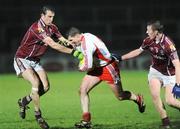7 March 2009; Colin Holmes, Tyrone, in action against Joe Bergin, left, and Mark Lydon, Galway. Allianz GAA National Football League, Division 1, Round 3, Tyrone v Galway, Healy Park, Omagh, Co. Tyrone. Picture credit: Oliver McVeigh / SPORTSFILE