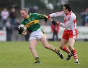 8 March 2009; Tommy Griffin, Kerry, in action against Kevin McGuckin, Derry. Allianz GAA National Football League, Division 1, Round 3, Derry v Kerry, Sean De Bruin Park, Bellaghy, Co. Derry. Picture credit: Oliver McVeigh / SPORTSFILE