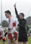8 March 2009; Referee, Joe McQuillan, shows Eoin Bradley, Derry, a yellow card. Allianz GAA National Football League, Division 1, Round 3, Derry v Kerry, Sean De Bruin Park, Bellaghy, Co. Derry. Picture credit: Oliver McVeigh / SPORTSFILE