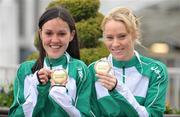 9 March 2009; Athletes Mary Cullen, left, and Derval O'Rourke with their bronze medals on their arrival home from the European Indoor Athletics Championships. Dublin Airport, Dublin. Photo by Sportsfile