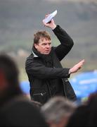 10 March 2009; A bookmaker uses 'tic-tac' to pass information during the opening day of the Chalentham Racing Festival 2009. Cheltenham Racing Festival, Prestbury Park, Cheltenham, Gloucestershire, England. Picture credit: Stephen McCarthy / SPORTSFILE