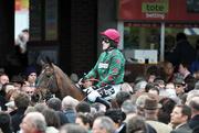 10 March 2009; Calgary Bay with Tony McCoy up on their way to the start before the Irish Independent Arkle Challenge Trophy Chase. Cheltenham Racing Festival, Prestbury Park, Cheltenham, Gloucestershire, England. Picture credit: David Maher / SPORTSFILE