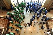 13 March 2009; Officials, sponsors and GAA President elect Christy Cooney, together with players from both the Leinster, green, and the Connacht, blue, teams disperse after a photocall in advance of the  M Donnelly Interprovincial Hurling Final presented by Etihad Airways to be played in the Ghantoot Polo Grounds. Emirates Palace, Abu Dhabi, United Arab Emirates. Picture credit: Ray McManus / SPORTSFILE