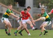 14 March 2009; Chris O'Donovan, Cork, in action against Tommy Walsh, left, Adrian Greaney, centre, and JB Spillane, Kerry. Cadbury Munster GAA Under 21 Football Championship, Cork v Kerry, Pairc Ui Rinn, Cork. Picture credit: Diarmuid Greene / SPORTSFILE