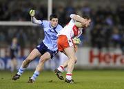 14 March 2009; Brian Mullan, Derry, in action against Ross McConnell, Dublin. Allianz GAA National Football League, Division 1, Round 4, Dublin v Derry, Parnell Park, Dublin. Photo by Sportsfile