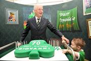 16 March 2009; Republic of Ireland manager Giovanni Trapattoni is presented with a 70th birthday cake, which he celebrates tomorrow on St. Patrick's day with 4 year old Aaron Piggott, from Dublin, at the launch of Soccer Republic.ie - eircom's New Soccer Website. eircom HQ, 1 Heuston South Quarter, Dublin. Picture credit: David Maher / SPORTSFILE