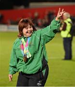 5 September 2015; Aoife O'Sullivan, from Ballinlough, Co. Cork, Special Olympics Ireland team member and multiple medal winner at the recent world games in LA, salutes the crowd at half time. Guinness PRO12 Round 1, Munster v Benetton Treviso. Irish Independent Park, Cork. Picture credit: Diarmuid Greene / SPORTSFILE