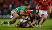 5 September 2015; Dave O'Callaghan, Munster, is tackled by Andrea Pratichetti, left, and Dean Budd, Benetton Treviso. Guinness PRO12 Round 1, Munster v Benetton Treviso. Irish Independent Park, Cork. Picture credit: Diarmuid Greene / SPORTSFILE