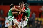 5 September 2015; Dave O'Callaghan, Munster, is tackled by Andrea Pratichetti, left, and Dean Budd, Benetton Treviso. Guinness PRO12 Round 1, Munster v Benetton Treviso. Irish Independent Park, Cork. Picture credit: Diarmuid Greene / SPORTSFILE