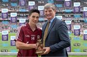 6 September2015; Representing Electric Ireland, proud sponsor of the GAA All-Ireland Minor Hurling Championship, is Pat O’Doherty, Chief Executive, ESB, presenting Evan Niland, Galway, with the Player of the Match award for his outstanding performance in the Electric Ireland GAA Minor Hurling Championship Final, Galway vs Tipperary in Croke Park. Throughout the Championship fans have followed the action, supported the Minors and been a part of something major through the hashtag #ThisIsMajor. Croke Park, Dublin. Picture credit: Brendan Moran / SPORTSFILE