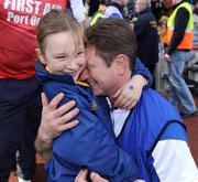 17 March 2009; Portumna manager Johnny Kelly celebrates with his daughter Alannah after the final whistle. AIB All-Ireland Senior Club Hurling Championship Final, Portumna, Co. Galway v De La Salle, Waterford, Croke Park, Dublin. Picture credit: Brendan Moran / SPORTSFILE