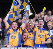17 March 2009; Portumna players, from left, David canning, Ollie Canning, Mike Gill and Pierce Tracey celebrate with the Tommy Moore Cup after the game. AIB All-Ireland Senior Club Hurling Championship Final, Portumna, Co. Galway v De La Salle, Waterford, Croke Park, Dublin. Picture credit: Brendan Moran / SPORTSFILE