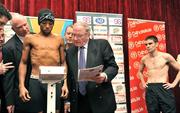 20 March 2009; Ricardo Cordoba is pictured on the scales as Bernard Dunne looks on during the Hunky Dory Fight Night Weigh-In ahead of their WBA World Super Bantamweight Title Fight on Saturday night. Grosvenor Room, Ballsbridge Court Hotel, Dublin. Picture credit: David Maher / SPORTSFILE