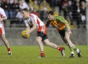 21 March 2009; Tommy McGuigan, Tyrone, in action against Paddy McDaid, Donegal. Allianz GAA National Football League, Division 1, Round 5, Donegal v Tyrone, Ballybofey, Co. Donegal. Picture credit: Oliver McVeigh / SPORTSFILE *** Local Caption ***