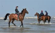 10 September 2015; A general view of jockeys and horses on the beach before the races begin. Laytown Races, Laytown, Co. Meath. Picture credit: Cody Glenn / SPORTSFILE