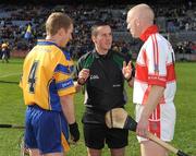 17 March 2009; Referee James McGrath with the  Portumna captain Ollie Canning and the De La Salle captain John Mullane. AIB All-Ireland Senior Club Hurling Championship Final, Portumna, Co. Galway, v De La Salle, Waterford, Croke Park, Dublin. Picture credit: Ray McManus / SPORTSFILE