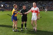 17 March 2009; Referee James McGrath with the  Portumna captain Ollie Canning and the De La Salle captain John Mullane. AIB All-Ireland Senior Club Hurling Championship Final, Portumna, Co. Galway, v De La Salle, Waterford, Croke Park, Dublin. Picture credit: Ray McManus / SPORTSFILE