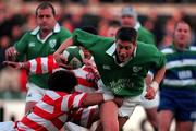 11 November 2000; Ronan O'Gara of Ireland is tackled by Michinori Oda of Japan during the International Rugby friendly match between Ireland and Japan at Lansdowne Road in Dublin. Photo by Ray Lohan/Sportsfile