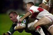 11 November 2000; Terry O'Connor of Ireland is tackled by Kris Radlinski of England during a Rugby League World Cup match between England and Ireland at Headingley in Leeds, England. Photo by Matt Browne/Sportsfile