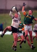 12 November 2000; Dessie Sloyane of Sligo fields the ball ahead of Mark O'Reilly of Meath during the Allianz National Football League Division 1B match betweeen Meath and Sligo at Pairc Tailteann, Navan in Meath. Photo by Damien Eagers/Sportsfile