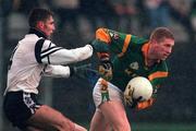 12 November 2000; Raymond Magee of Meath is tackled by Brendan Philips of Sligo during the Allianz National Football League Division 1B match betweeen Meath and Sligo at Pairc Tailteann, Navan in Meath. Photo by Damien Eagers/Sportsfile