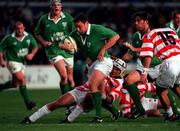 11 November 2000; Rob Henderson of Ireland in action against Hiroshi Sugawara of Japan during the International Rugby friendly match between Ireland and Japan at Lansdowne Road in Dublin. Photo by Ray Lohan/Sportsfile