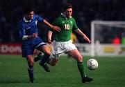 26 April 2000; Robbie Keane of Republic of Ireland in action against Georgios Amanatidis of Greece during the International Friendly match between Republic of Ireland and Greece at Lansdowne Road in Dublin. Photo by David Maher/Sportsfile