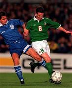 26 April 2000; Mark Kinsella of Republic of Ireland is tackled by Georgios Amanatidis of Greece during the International Friendly match between Republic of Ireland and Greece at Lansdowne Road in Dublin. Photo by David Maher/Sportsfile