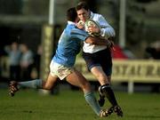 9 December 2000;  Conor Mahony of Cork Constitution is tackled by Jeremy Staunton of Garryowen during the AIB All-Ireland League Division 1 match between Garryowen and Cork Constitution at Dooradoyle in Limerick. Photo by Brendan Moran/Sportsfile