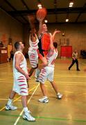 10 December 2000; Paddy Kelly of Thorn Killester bursts through the Neptune defence during the ESB Mens National Cup round 2 game between Thorn Killester and Neptune in Clontarf, Dublin. Photo by Ray McManus/Sportsfile