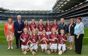 6 September 2015; President of the INTO Emma Dineen, Uachtarán Chumann Luthchleas Gael Aogán Ó Fearghail, President of Cumann na mBunscoil Maireád O'Callaghan, President of the Camogie Association Catherine Neary, with the Galway team, back row, left to right, Sophie Barrett, Holy Rosary N.S., Firhouse, Dublin 24, Maria O’Meara, Cashel G.N.S., Co. Tipperary, Ciara Irwin, Glounthane N.S., Co. Cork, Michaela Donoghue, Drumphea N.S., Bagenalstown, Co. Carlow, Aisling Keenan, St. Mary’s P.S., Bellanaleck, Co. Fermanagh, front row, left to right, Ciara Nic Shiacais, Gaelscoil Uí Earcáin, Fionnghlas, Áth Cliath 11, Caoimhe Cliffe, Bunscoil Bhóthar na Naomh, Lismore, Co. Waterford, Aoife Grogan, St. Colmcille’s P.S., Omagh, Co. Tyrone, Riesse Donlon, Gaelscoil de hÍde, Cnoc na Cruibe, Baile Ros Comáin, and Caoimhe Gilligan, Castlerock N.S., Aclare, Co. Sligo, before the Cumann na mBunscoil INTO Respect Exhibition Go Games 2015 at Kilkenny v Galway - GAA Hurling All-Ireland Senior Championship Final. Croke Park, Dublin. Picture credit: Dáire Brennan / SPORTSFILE