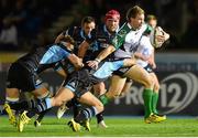 11 September 2015; Kieran Marmion, Connacht, is tackled by Mike Blair, Glasgow Warriors. Guinness PRO12, Round 2, Glasgow Warriors v Connacht, Scotstoun Stadium, Glasgow, Scotland. Picture credit: Paul Devlin / SPORTSFILE