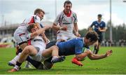 12 September 2015; Caelan Doris, Leinster captain, goes through the tackles of Ben Finlay, middle, and Jonathon Stewart, left, Ulster, as he scores his team's second try. Schools Interprovincial Rugby Championship, Round 2, Ulster v Leinster, Belfast Harlequins RFC, Deramore Park, Belfast, Co. Antrim. Picture credit: Seb Daly / SPORTSFILE