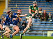 12 September 2015; Fergal Flattery, Meath, shoots for goal despite the best efforts of Daniel Staunton, left, and Jim Doyle, Wicklow. Bord Gais Energy GAA Hurling All-Ireland U21 B Championship Final, Meath v Wicklow, Semple Stadium, Thurles, Co. Tipperary. Picture credit: Brendan Moran / SPORTSFILE