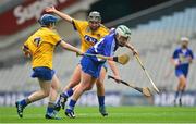 13 September 2015; Laura Marie Maher, Laois, in action against Joanne Beattie, left, and Niamh Coyle, Roscommon. Liberty Insurance All Ireland Premier Junior Camogie Championship Final, Laois v Roscommon. Croke Park, Dublin. Picture credit: Piaras Ó Mídheach / SPORTSFILE
