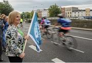 13 September 2015; The Irish Sports Council, in conjunction with Cycling Ireland teamed up with the Department of Transport, Tourism and Sport, Dublin City Council and Healthy Ireland for the Great Dublin Bike Ride which seen over 3,000 participants of all abilities from novice to expert ride 60km or 100km routes. Pictured is Lord Mayor of Dublin Críona Ní Dhálaigh, waving the flag to begin the event. The Great Dublin Bike Ride. Smithfield Square, Dublin. Picture credit: Seb Daly / SPORTSFILE