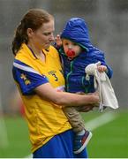 13 September 2015; Roscommon's Siobhán Coyle with her nephew Eric Waldron, aged 3, after the game. Liberty Insurance All Ireland Premier Junior Camogie Championship Final, Laois v Roscommon. Croke Park, Dublin. Picture credit: Piaras Ó Mídheach / SPORTSFILE